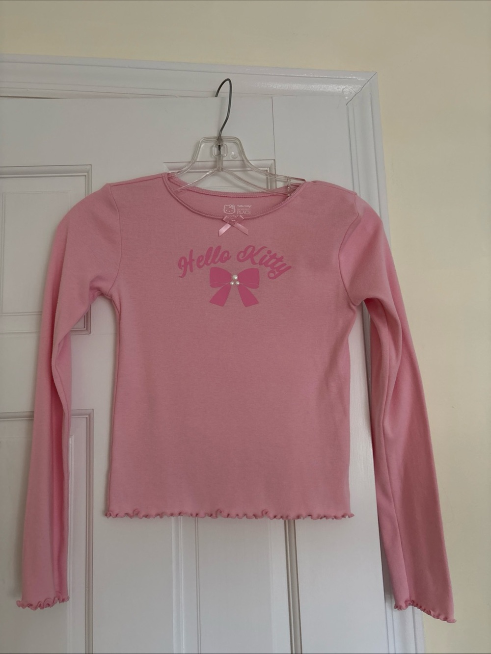 Girls Hello Kitty Light Pink Long Sleeve Top with Pearl Accents, size 10-12